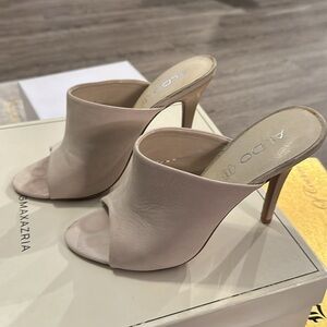 Cream Aldo open toe heels.